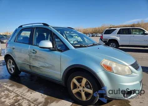 2009 Suzuki Sx4 Touring z USA, uszkodzony, nr VIN JS2YB417X96202988